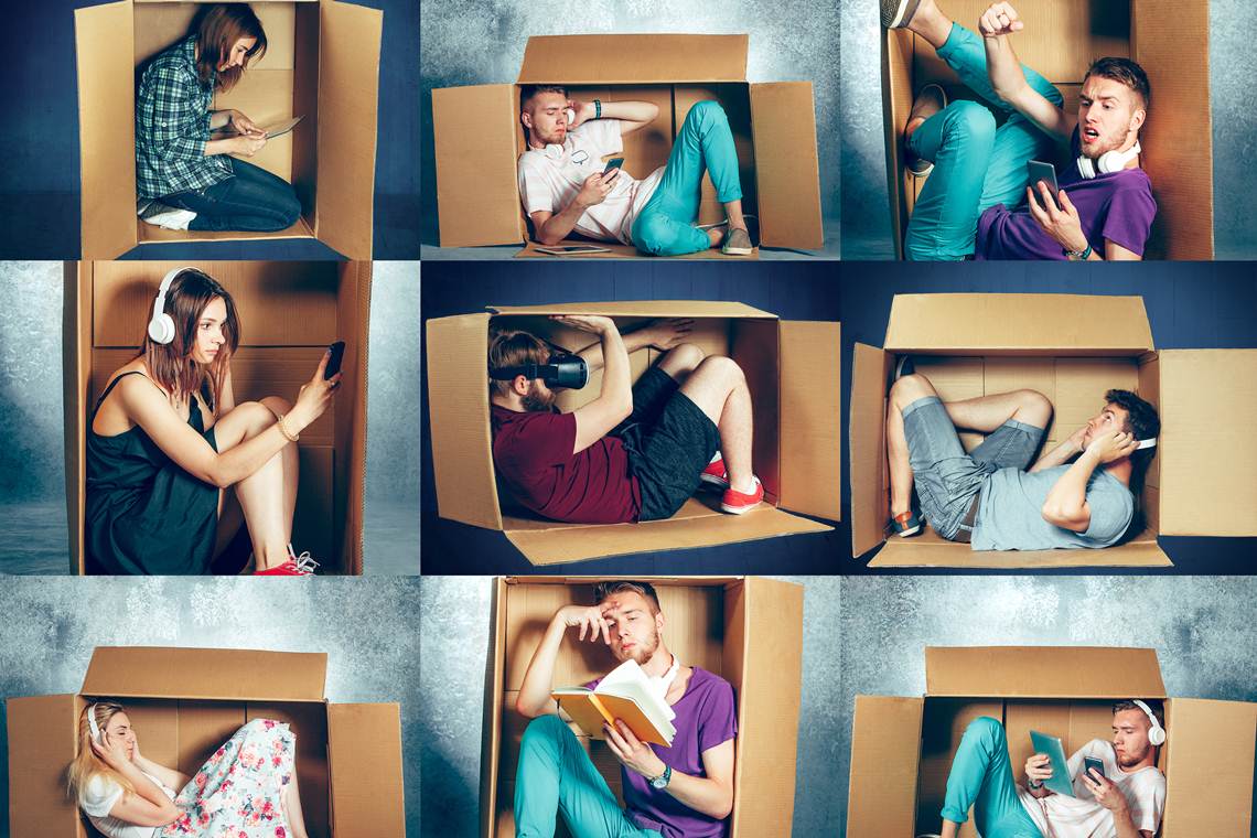 People at quarantine because of coronavirus spreading - sitting inside little boxes, staying home concept isolamento social